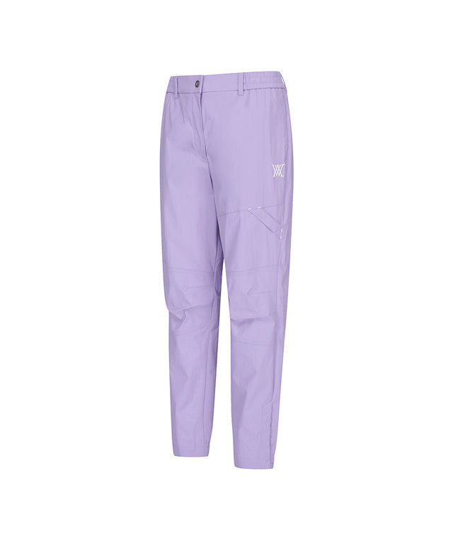 Lavender ANEW Golf Women Ventilation Slim Jogger Long Pants showcasing stylish design and comfortable fit.